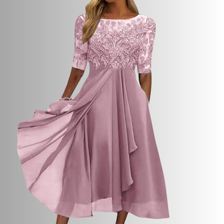Chique groene midi jurk voor dames, A-lijn model met bovenstuk, ronde hals en elegante halve mouw.