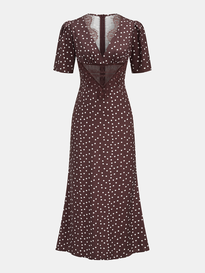 Stijlvolle damesjurk: bruine midi met v-hals, all-over stippenprint. Comfortabel voor casual of speciale momenten.