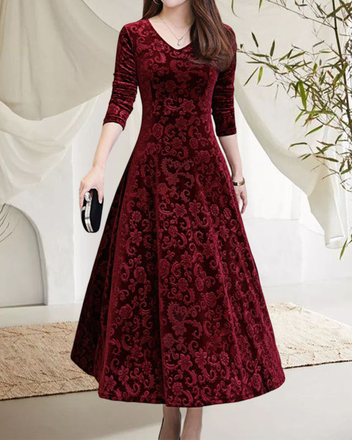 Stijlvolle dames feestjurk: een elegante rode midi jurk met V-hals en lange mouwen voor gala's of diners.