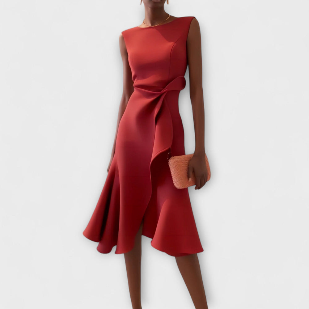 Mouwloze midi damesjurk met asymmetrische volant zoom, ideaal als feestjurk of avondjurk. Zomerproof.