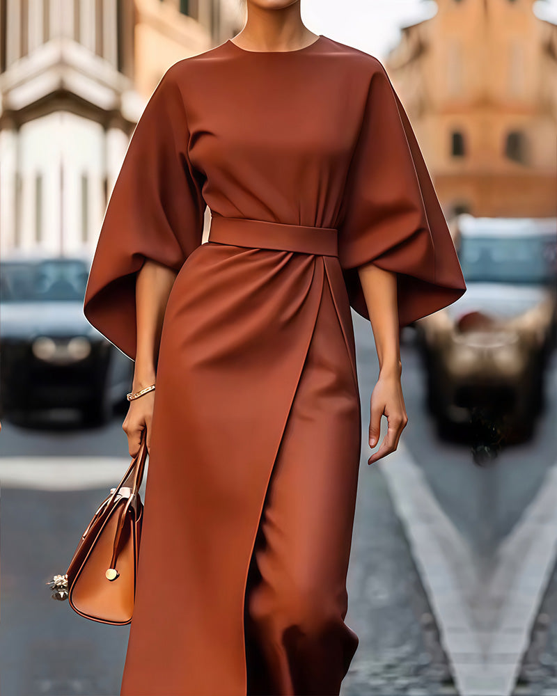 Elegante dames midi zomerjurk met driekwart mouwen en stijlvolle riem, perfect voor zowel casual als feestelijke gelegenheden.