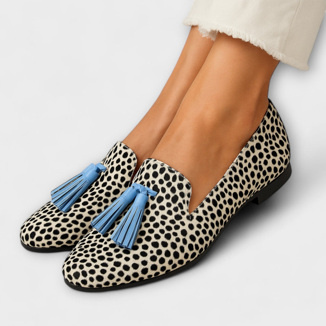 Elegante dames mocassins met kwastjes en dierprint, comfortabele instappers voor klassieke herfstmode.