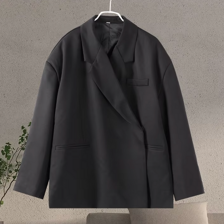 Tijdloze dames oversized blazer, combineert elegantie met moderne flair; perfect voor zakelijke en casual mode.