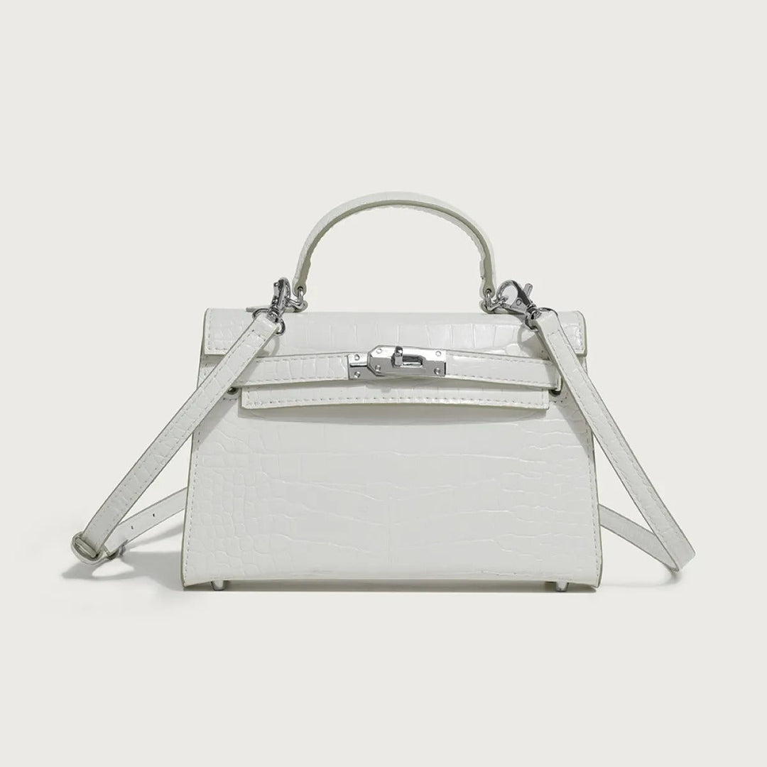 Modieuze dames schoudertas van veganistisch leer, elegant gedragen als accessoire, ideaal voor een chique look.