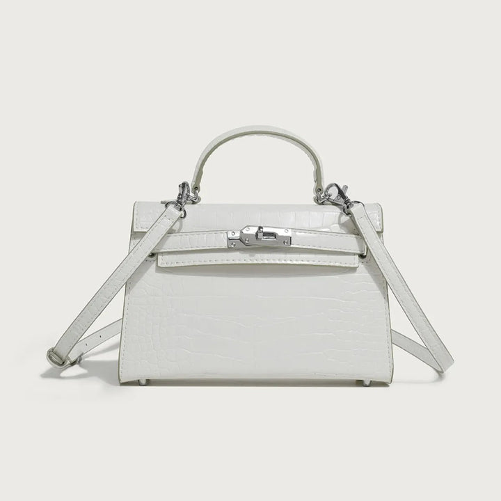 Modieuze dames schoudertas van veganistisch leer, elegant gedragen als accessoire, ideaal voor een chique look.