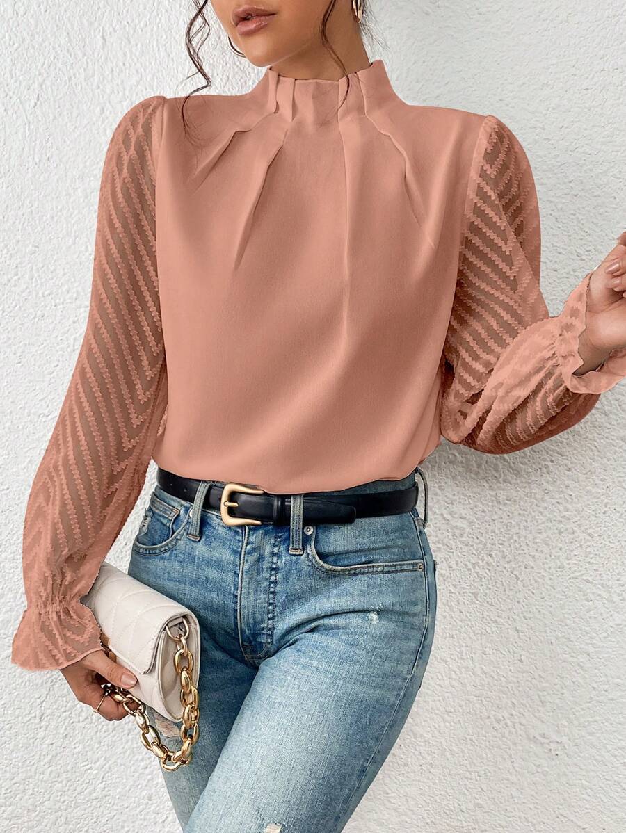 Comfortabele dames top met moderne opstaande hals, perfect als veelzijdige en stijlvolle dagelijkse kleding.