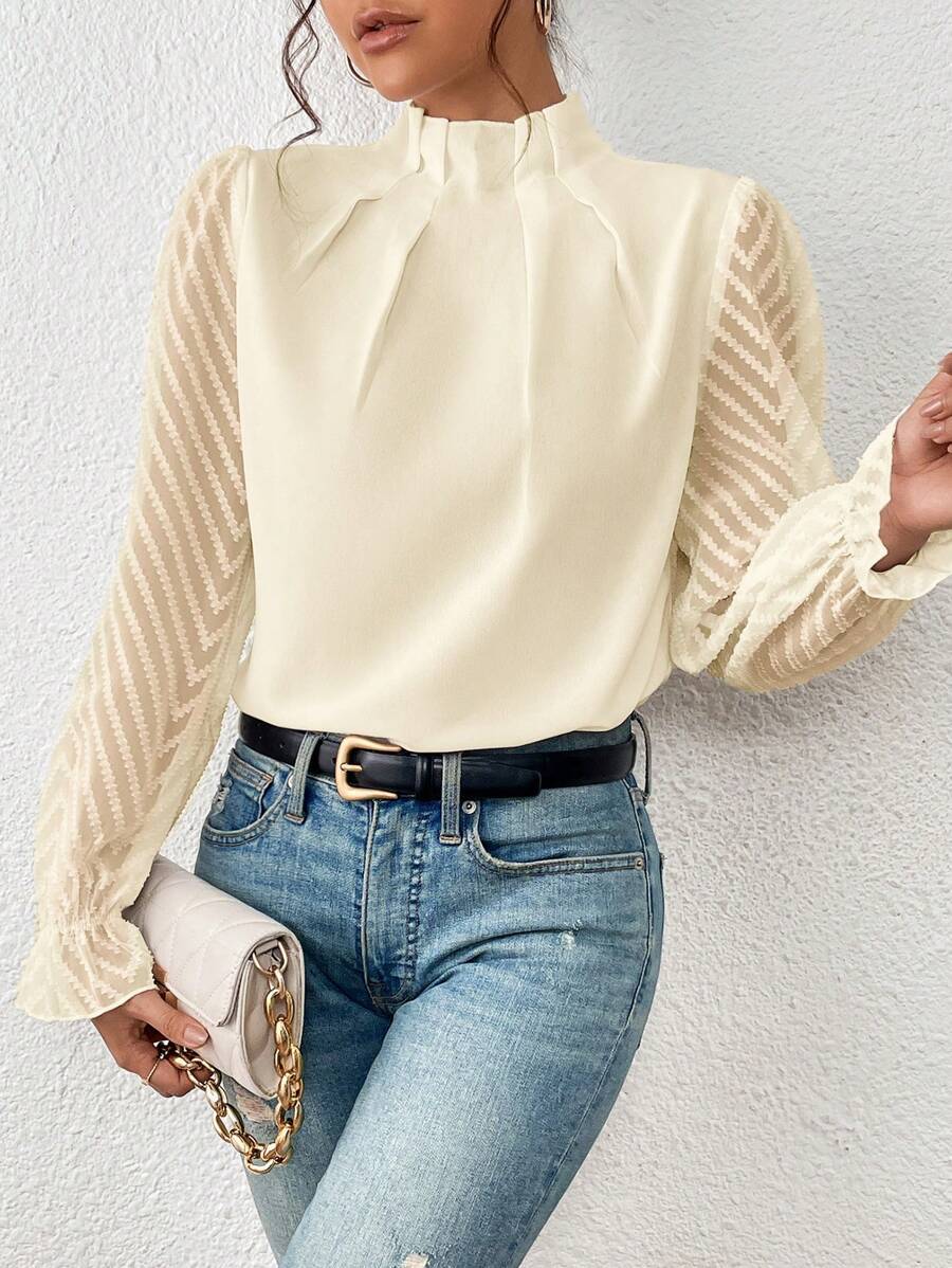 Elegante vrouwen blouse met opstaande hals en lange mouwen, een veelzijdige toevoeging aan je garderobe.