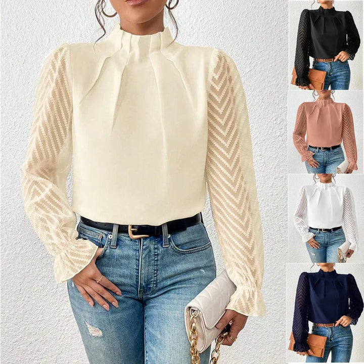 Moderne en stijlvolle dames top met opstaande hals, ideaal voor een trendy en comfortabele look.