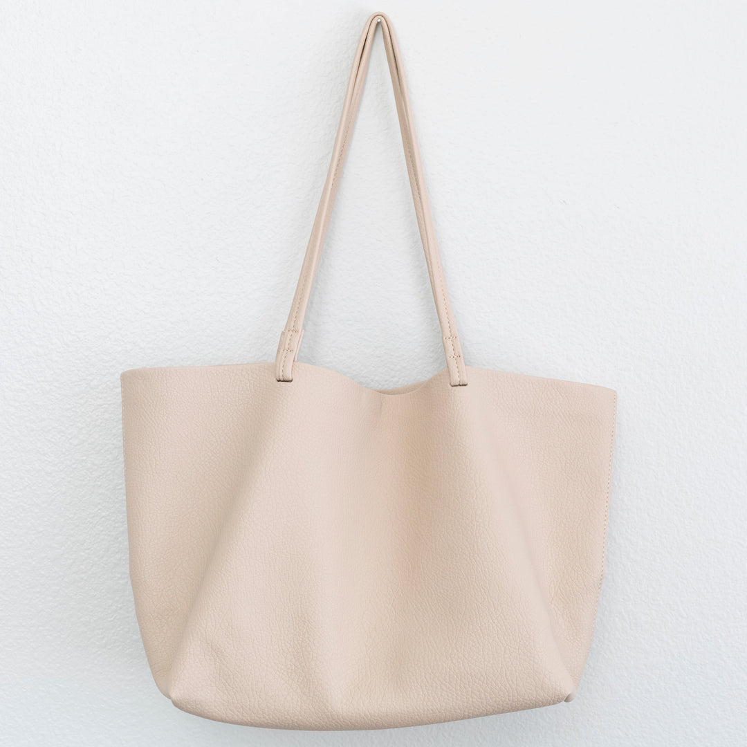 Duurzame dames handtas, veelzijdige tote bag. Perfecte laptop tas en elegante schoudertas.