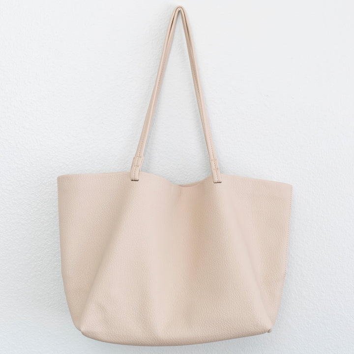 Duurzame dames handtas, veelzijdige tote bag. Perfecte laptop tas en elegante schoudertas.