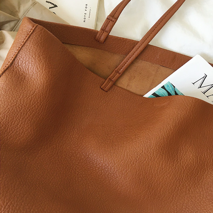 Modieuze dames werktas, ruime laptop tas. Stijlvolle schoudertas, ook ideaal als weekendtas.