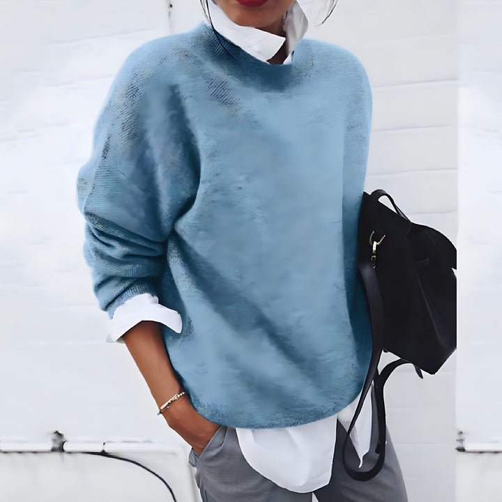 Zachte gebreide dames trui, elegant en warm, perfect voor een comfortabele en stijlvolle winterdag.