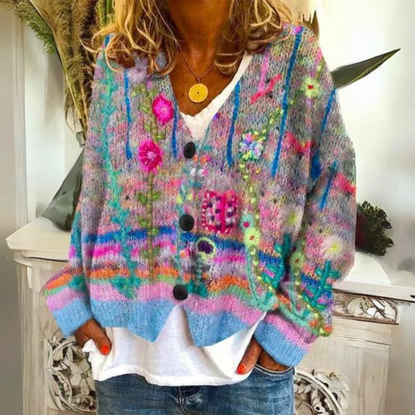 Elegante dames trui met levendige bloemenprint, ideaal voor comfortabele en stijlvolle vrouwenkleding.