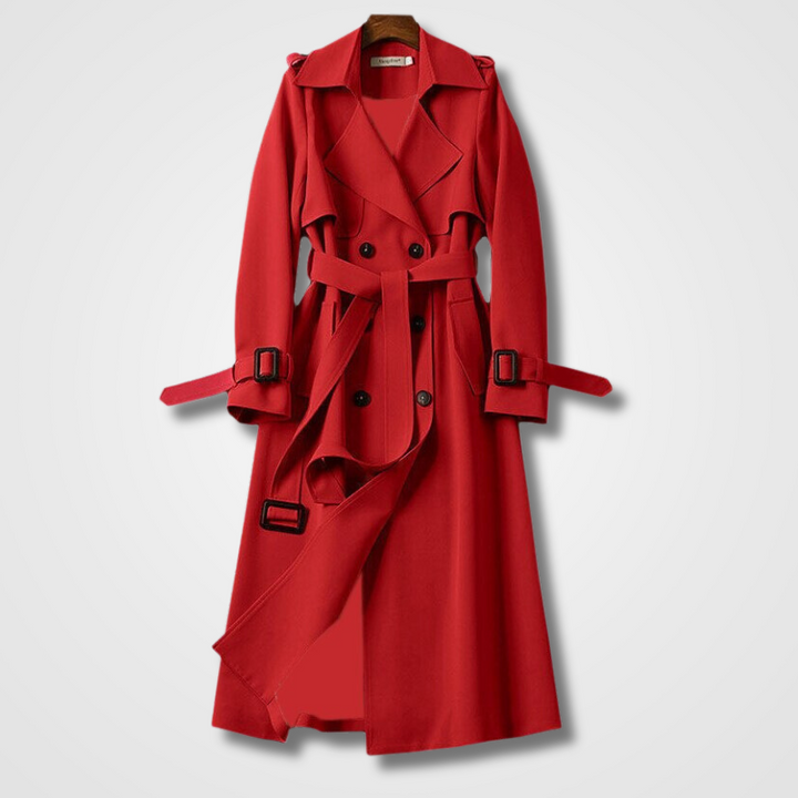 Lange dames tussenjas met brede ceintuur en chique dubbele knopen, ideaal voor een elegante look.