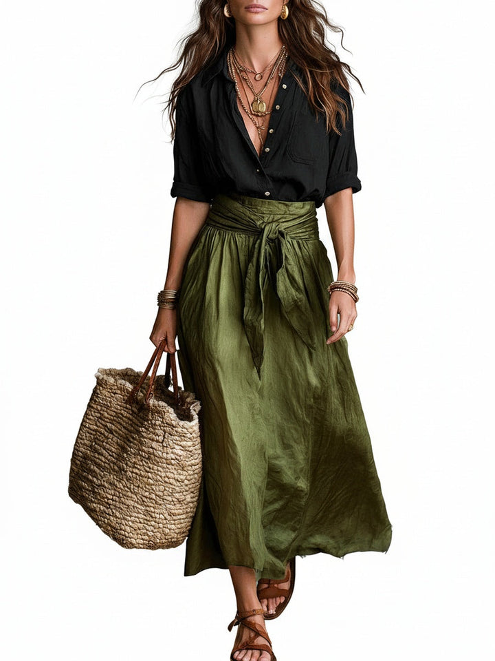Elegante dames tweedelige set met midi rok en blouse; perfecte zomeroutfit voor elke gelegenheid.