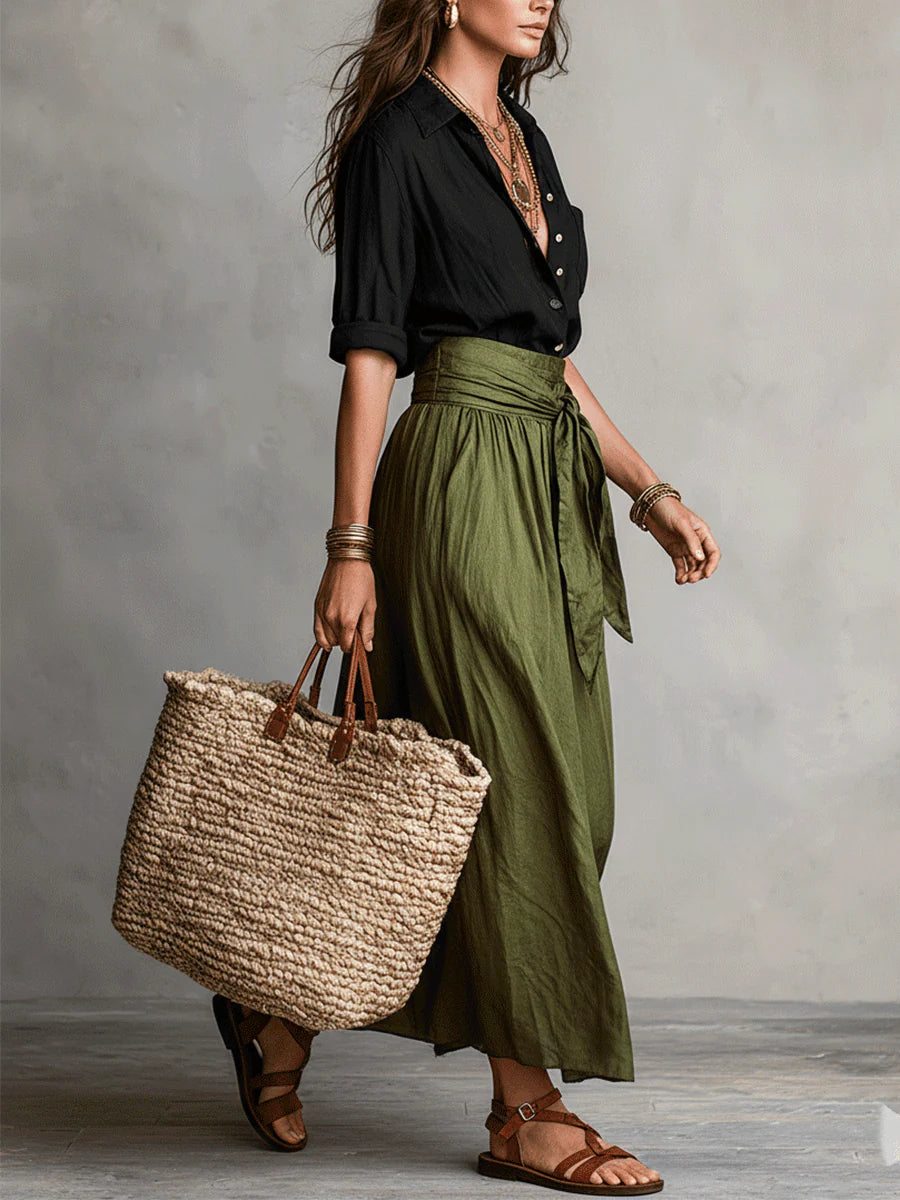 Veelzijdige dames co-ord set: stijlvolle blouse en comfortabele midi rok, ideaal voor zomer.