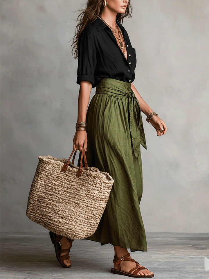 Veelzijdige dames co-ord set: stijlvolle blouse en comfortabele midi rok, ideaal voor zomer.