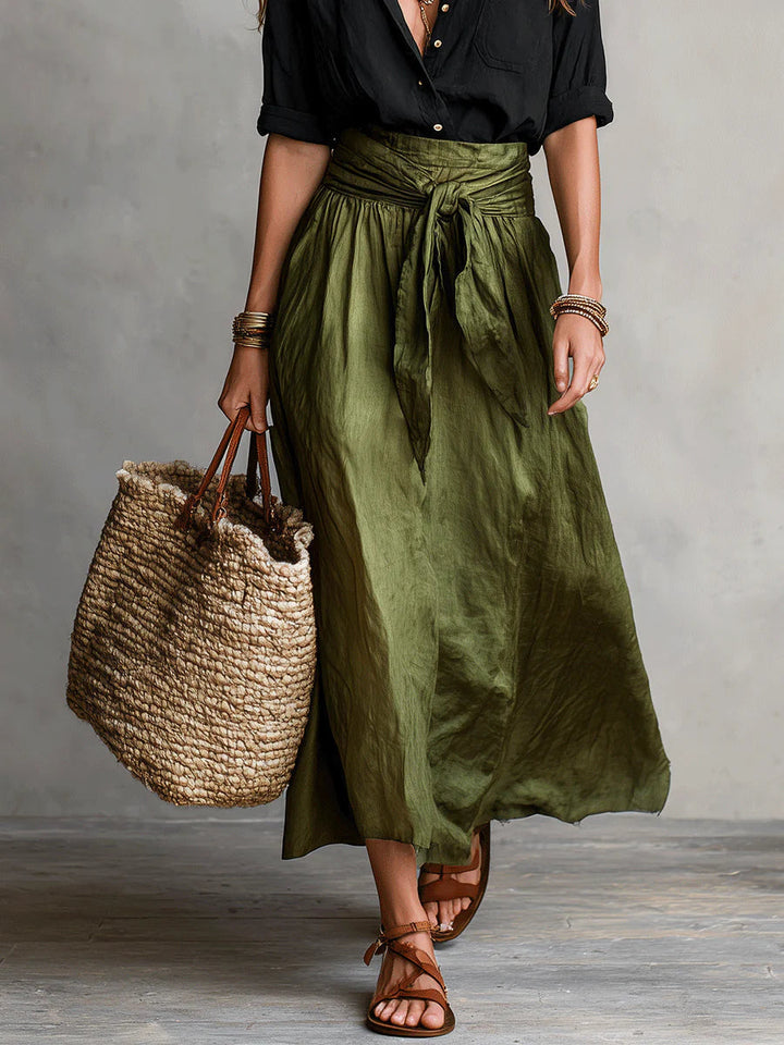 Zomerse dames set: comfortabele blouse en elegante midi rok met strikceintuur. Ideaal voor werk of vrije tijd.