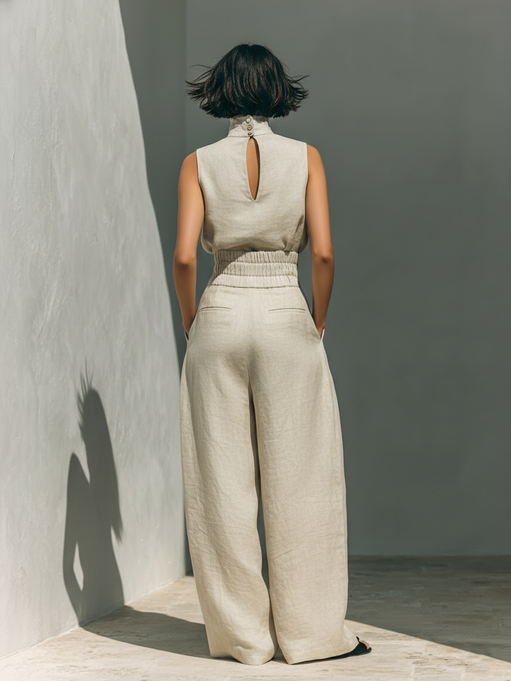 Tweedelige dames kleding set: mouwloze rolkraag top en elegante wijde broek met hoge taille; modieus en veelzijdig.