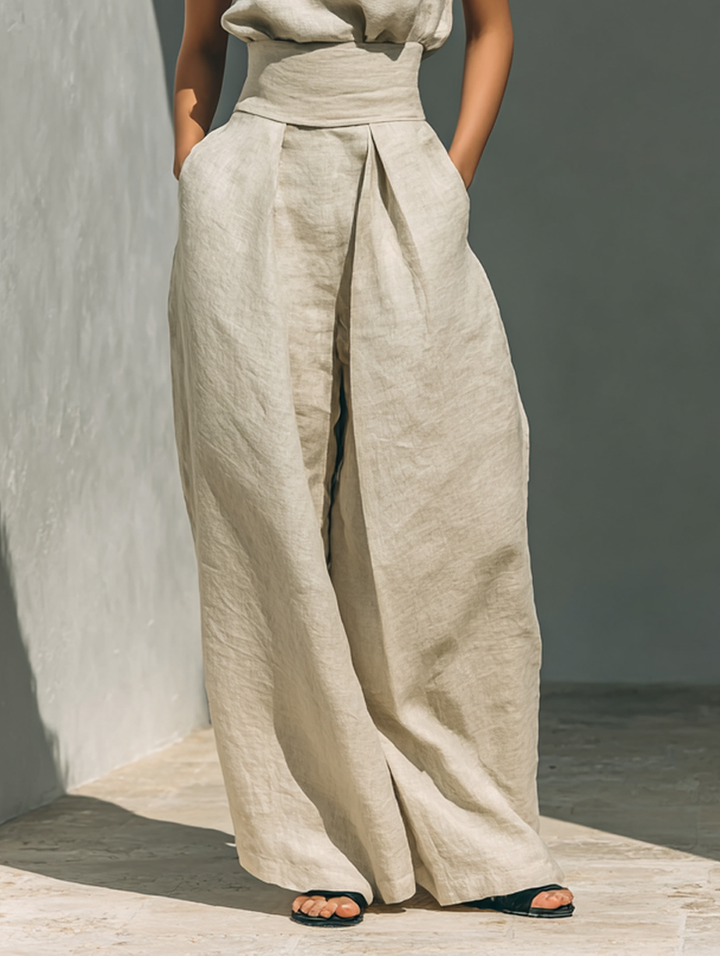 Dames elegante tweedelige set: mouwloze rolkraag top & wijde broek met hoge taille. Modieuze co-ord set.