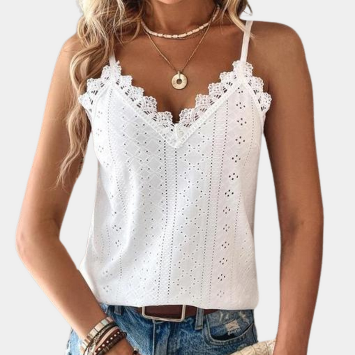 Casual elegante dames V-hals top met flatterende pasvorm en verfijnde details. Ideaal voor zomerse dagen.