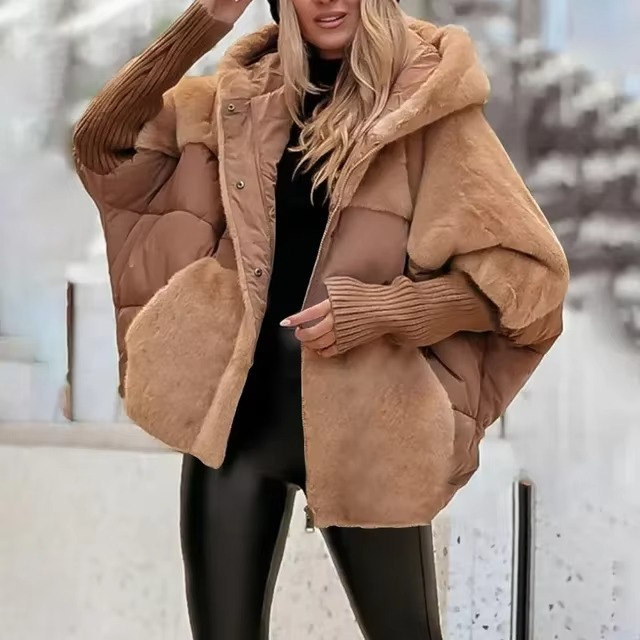 Comfortabele effen winterjas voor dames. Een elegante pasvorm die warmte biedt in de winter.