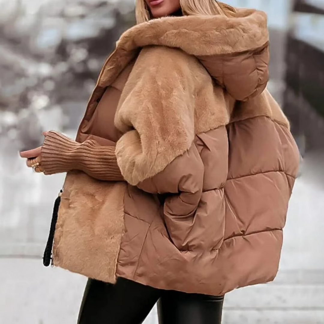 Stijlvolle dames winterjas, effen en warm. Deze modieuze jas is perfecte bovenkleding voor koude dagen.