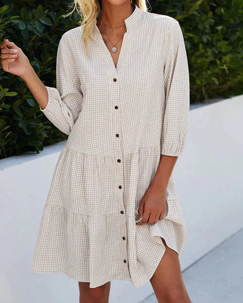 Casual midi zomerjurk voor dames met 3/4 mouw en ruitpatroon. Geschikt voor dagelijks comfort in de lente.