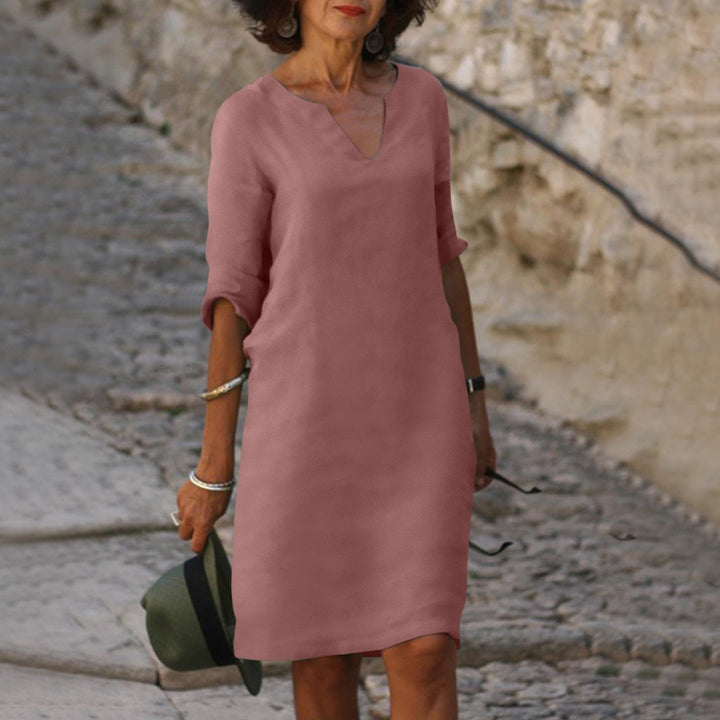 Trendy dames midijurk met V-hals, korte mouwen en een elegante, casual pasvorm.