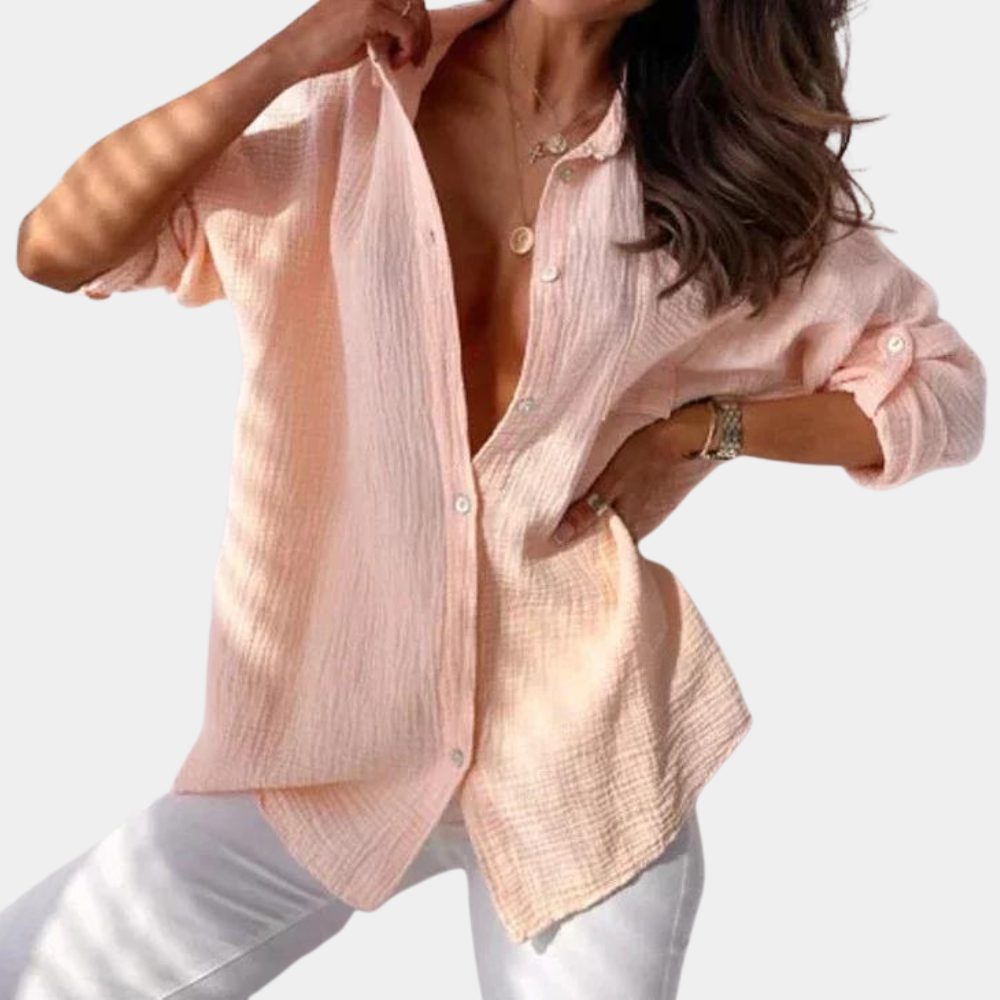 Comfortabele losvallende damesblouse met klassieke kraag en knoopsluiting. Ideaal voor casual dagen of office chic.