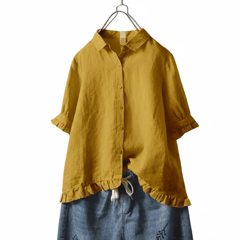 Elegante damesblouse met ruche-zoom en korte mouwen, ideaal voor zomer en een casual look.