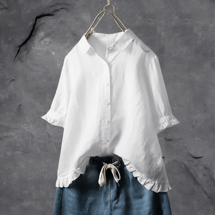 Lichtgewicht zomerse damesblouse met korte mouwen en ruche details, perfect voor warme dagen en een frisse uitstraling.