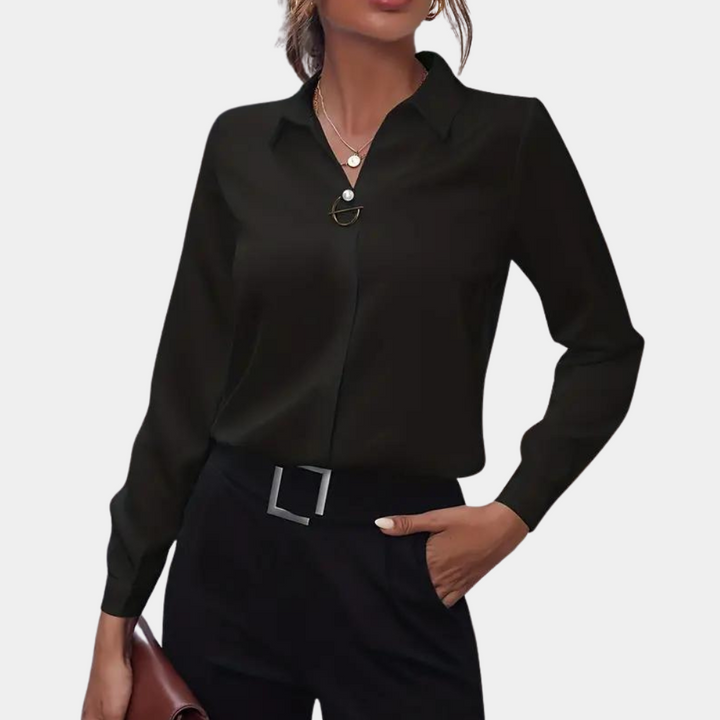 Elegante damesblouse, tijdloos en veelzijdig, perfect voor zakelijk of casual gebruik. Comfortabel en modieus.