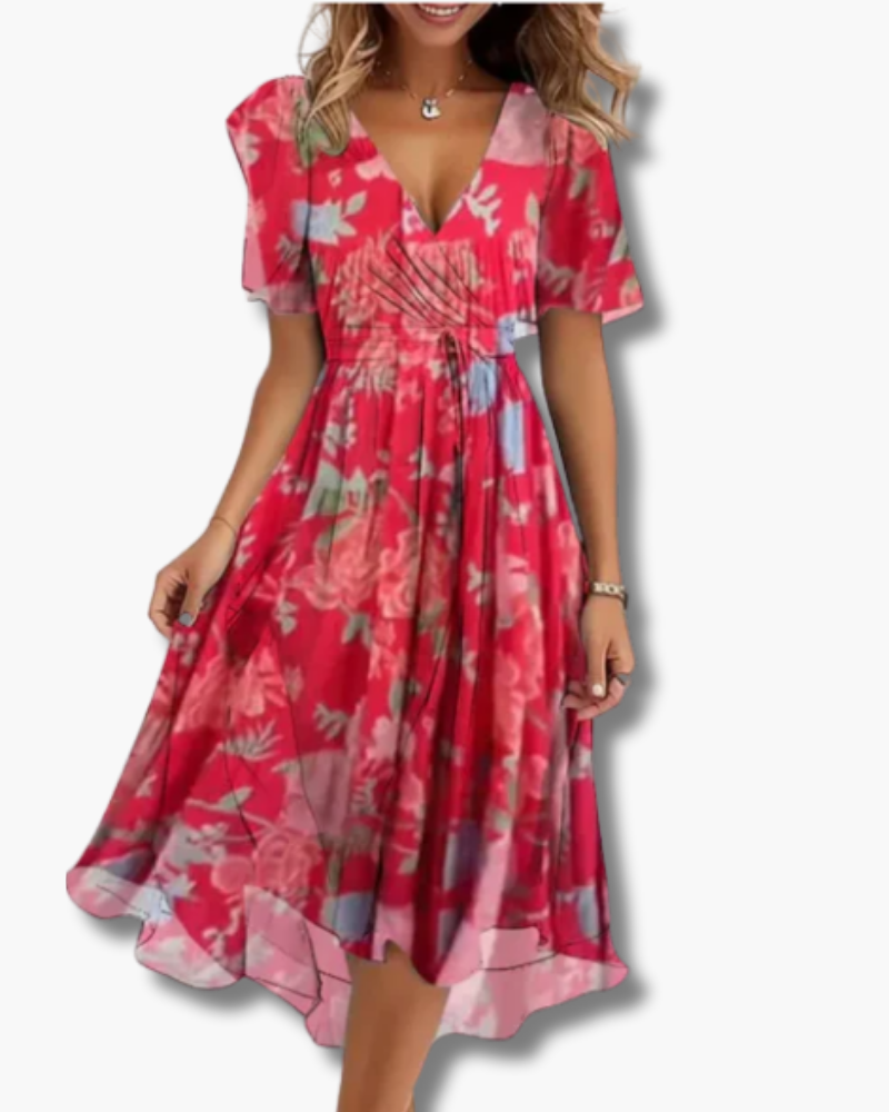 Soepelvallende, comfortabele zomerjurk met vrolijke bloemenprint, perfect voor casual lente en zomer mode.