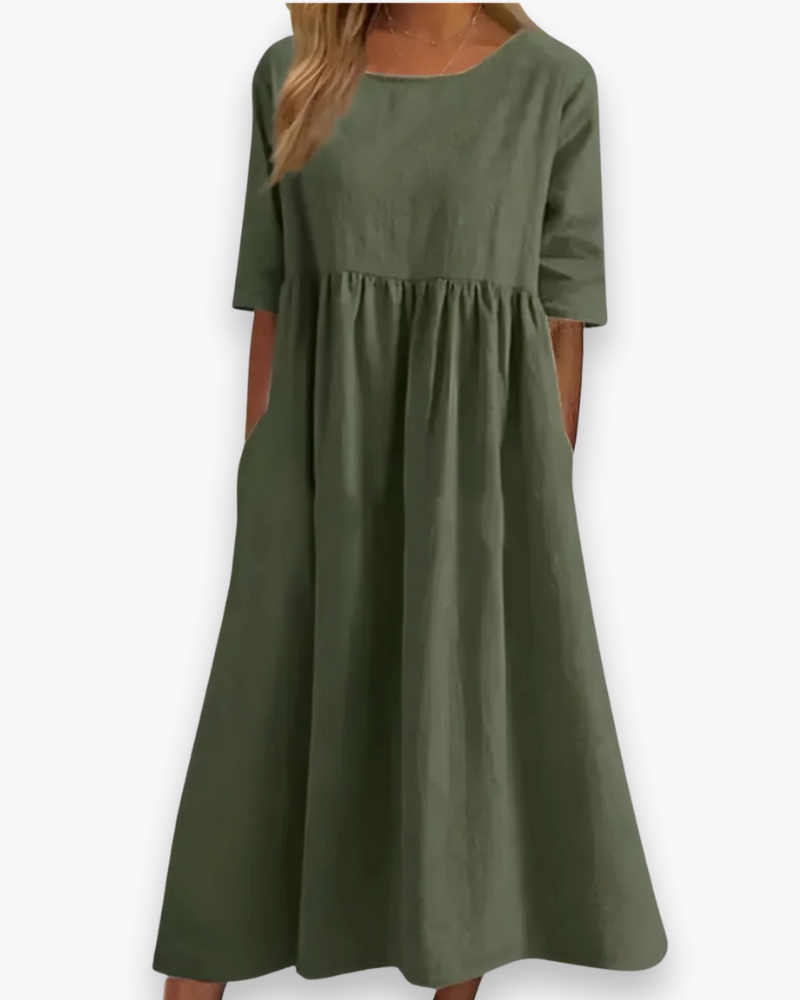 Midi-jurk met ronde hals en geplooide rok, een elegante en veelzijdige damesjurk.