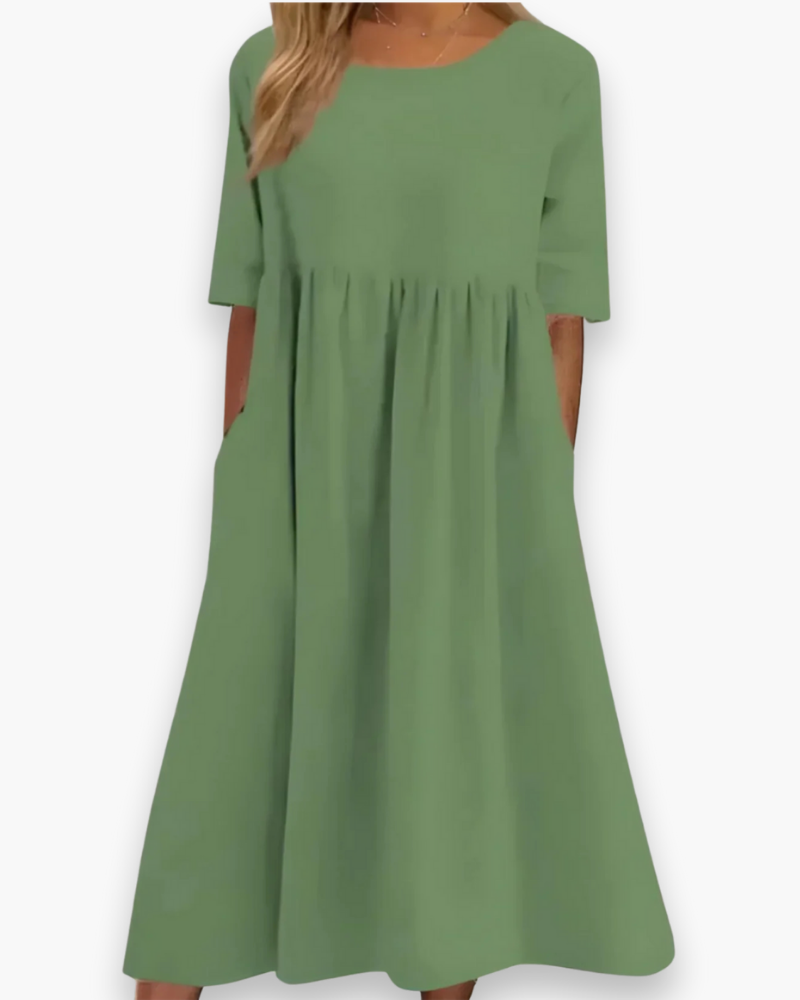 Veelzijdige effen dames midi-jurk met zakken, comfortabel en stijlvol voor elke gelegenheid.