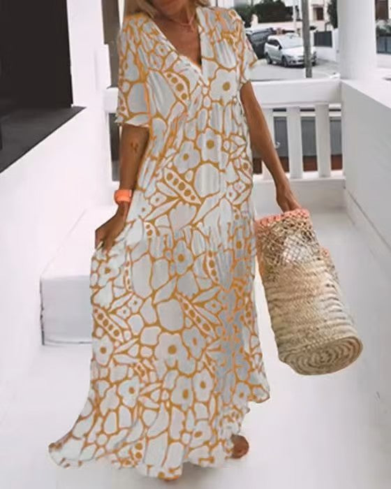 Vloeiende lange damesjurk Rosalie, een comfortabele en elegante maxi jurk met V-hals voor elke gelegenheid.
