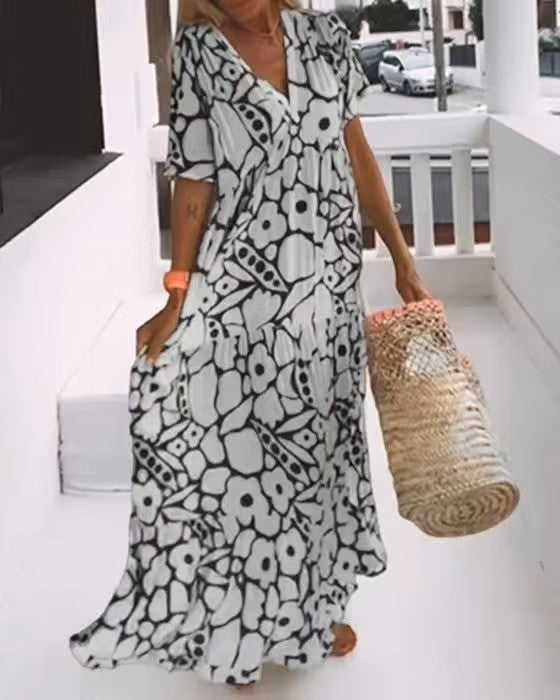 Comfortabele en chique dames maxi jurk Rosalie. Deze elegante lange jurk met V-hals is ideaal voor casual en stijlvol dragen.