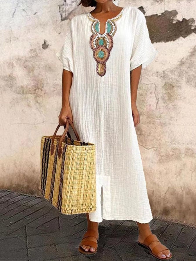 Elegante dames maxi jurk met verfijnd borduurwerk, een chique kaftan voor zomerse avonden.