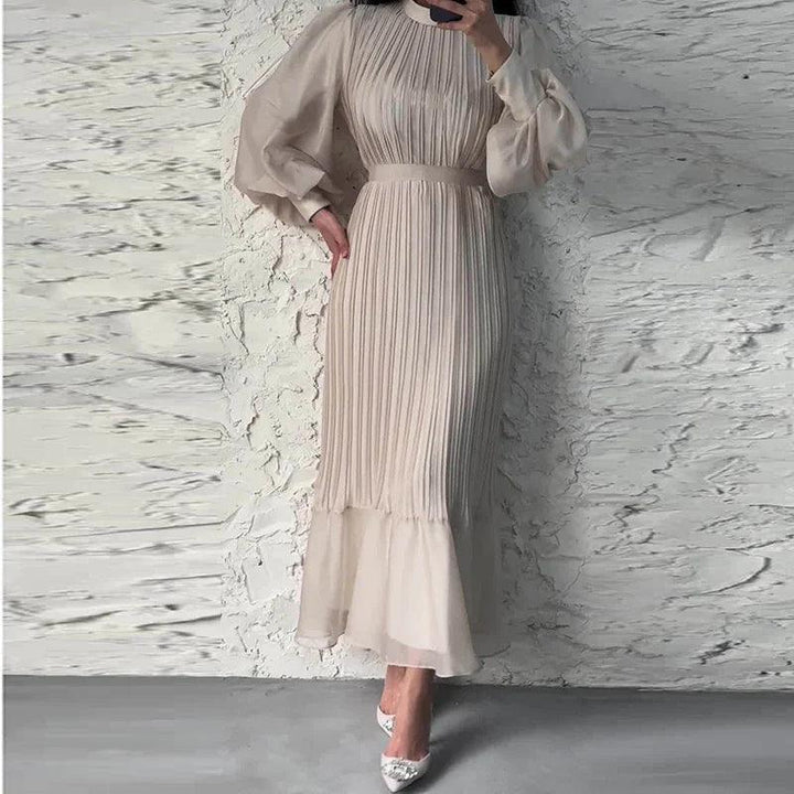 Chique feestjurk: geplooide midi damesjurk met elegante ballonmouwen. Perfect voor speciale gelegenheden en avonden.