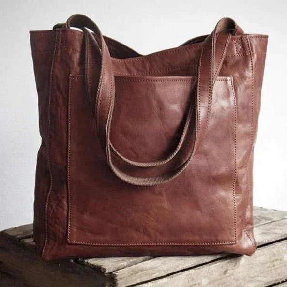 "Elegante grote leren damestas voor vrouwen, bruine schoudertas met ruime opbergruimte en tijdloos ontwerp."