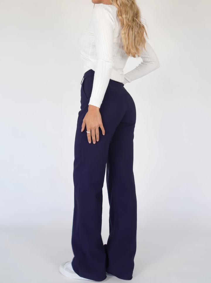 Elegante high-waist pantalon dames met rechte pijpen, zachte stretchstof, blinde ritssluiting; modieus en comfortabel.