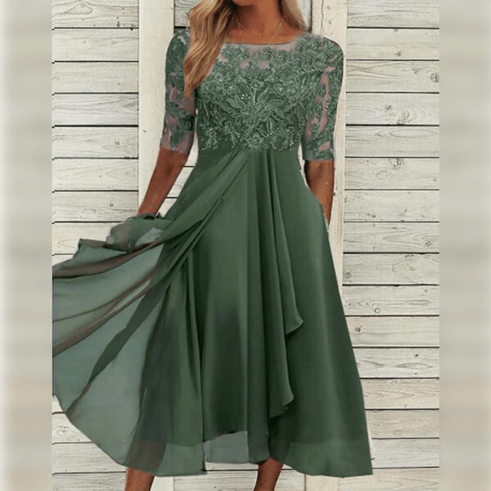 Dames kanten jurk met zomerse pasvorm, ideaal voor warme dagen. Chique en comfortabele vrouwenmode.