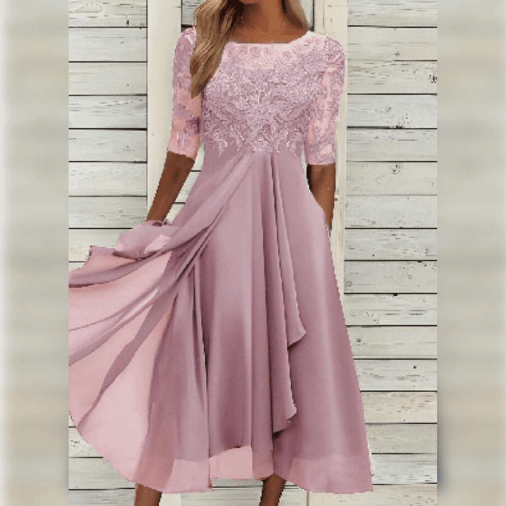 Zomerse kanten jurk voor dames, met een comfortabele pasvorm. Perfect voor vakantie of een dagje uit. Grote maten.