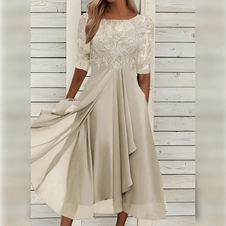 Modieuze kanten feestjurk voor dames, elegante stijl en comfortabel. Ideale zomerjurk voor speciale momenten.