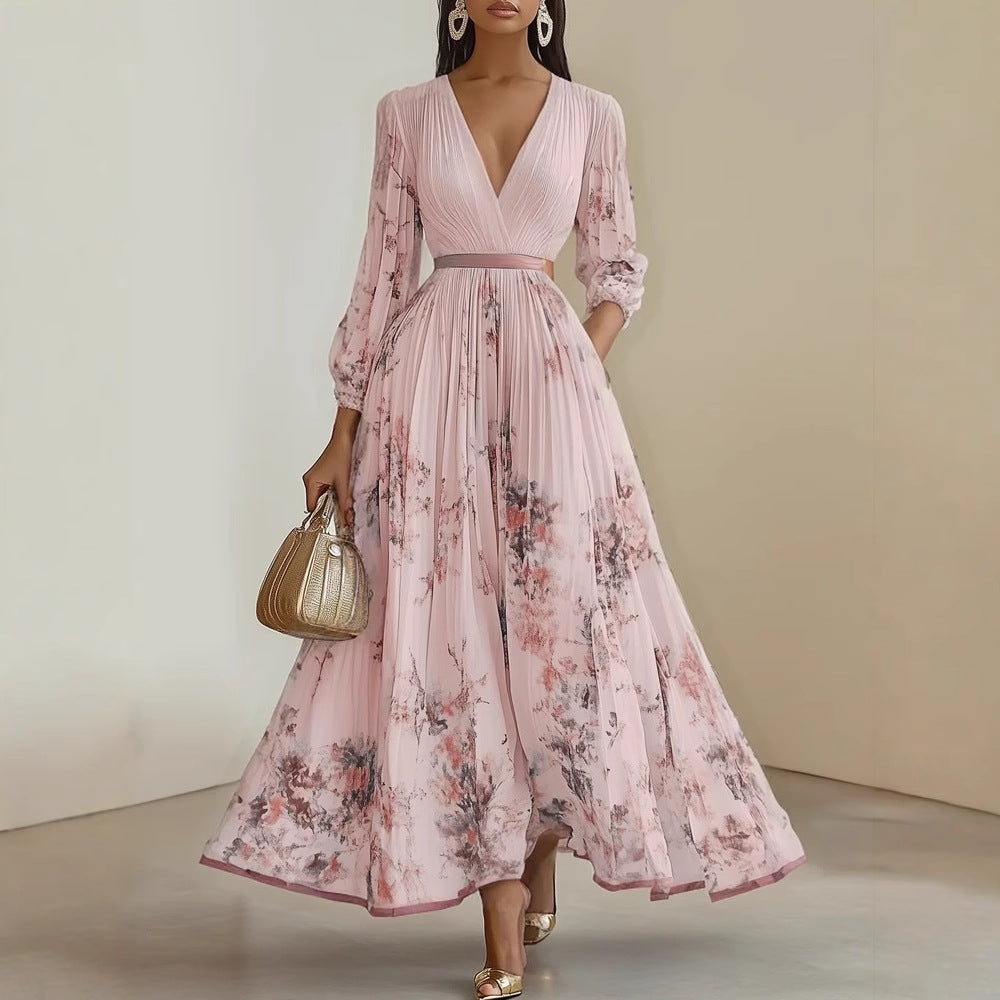Lange dames feestjurk met gedetailleerde bloemenprint, een elegante avondjurk die prachtig valt.