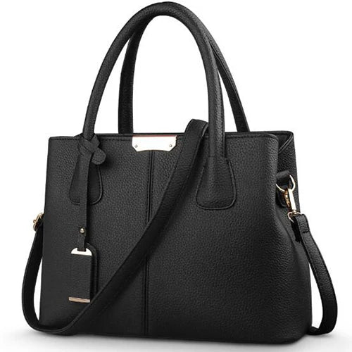 Elegante leren schoudertas voor dames, stijlvol en ruim, met verstelbare riem en verschillende kleurkeuzes.