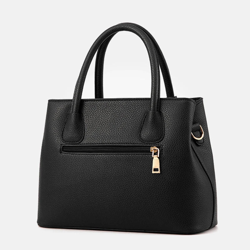 Elegante leren schoudertas voor dames, stijlvol en ruim, met verstelbare riem en verschillende kleurkeuzes.