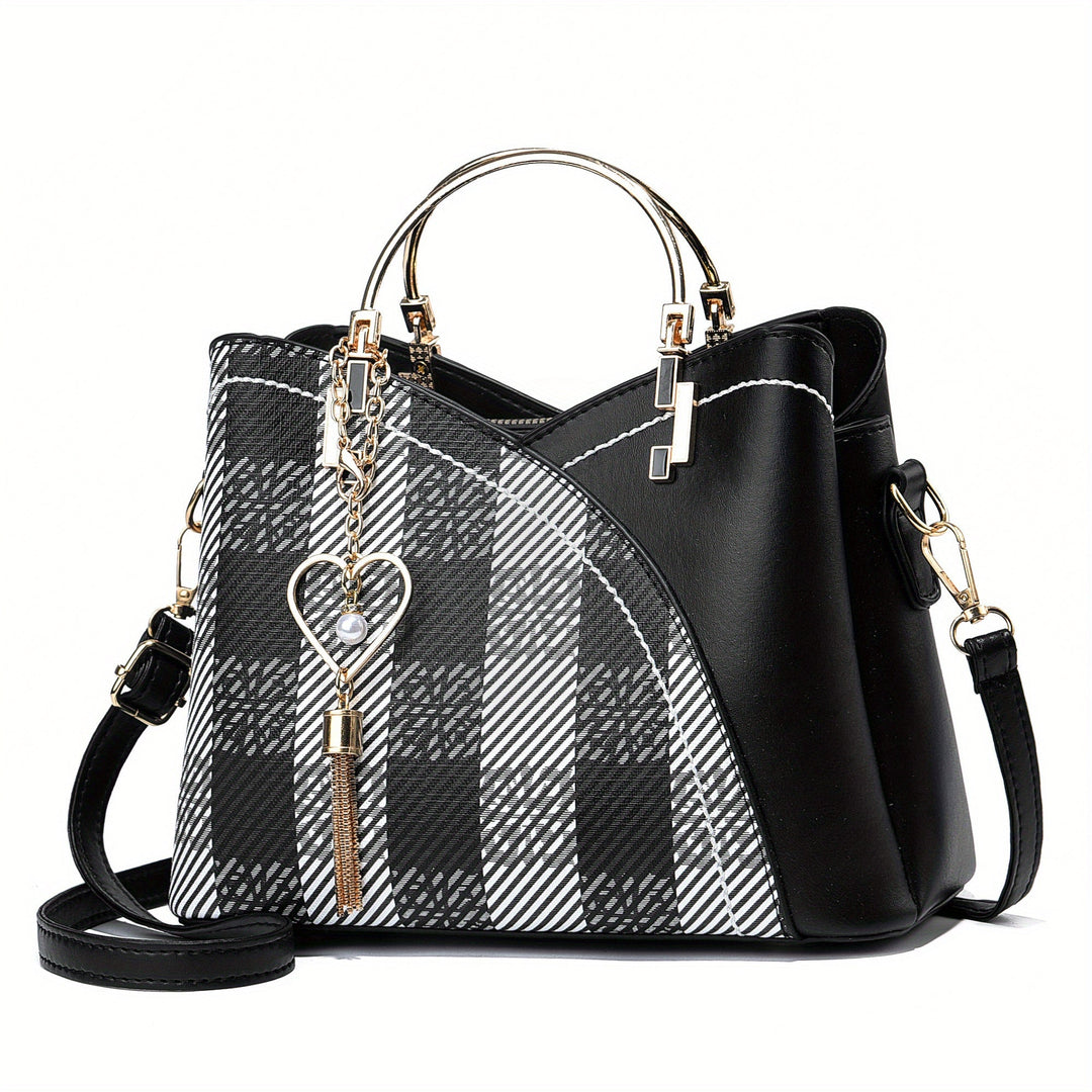 "Elegante luxe leren handtas met stijlvol kleurblokontwerp en kwastjes, perfect voor de moderne vrouw, frontaal gezien."