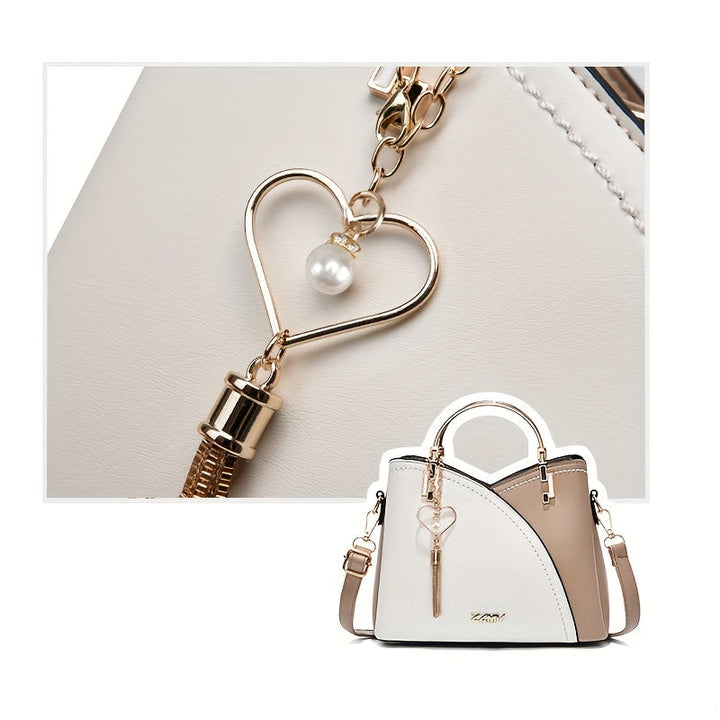 "Elegante luxe leren handtas met stijlvol kleurblokontwerp en kwastjes, perfect voor de moderne vrouw, frontaal gezien."